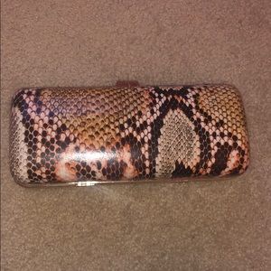 Snakeskin clutch